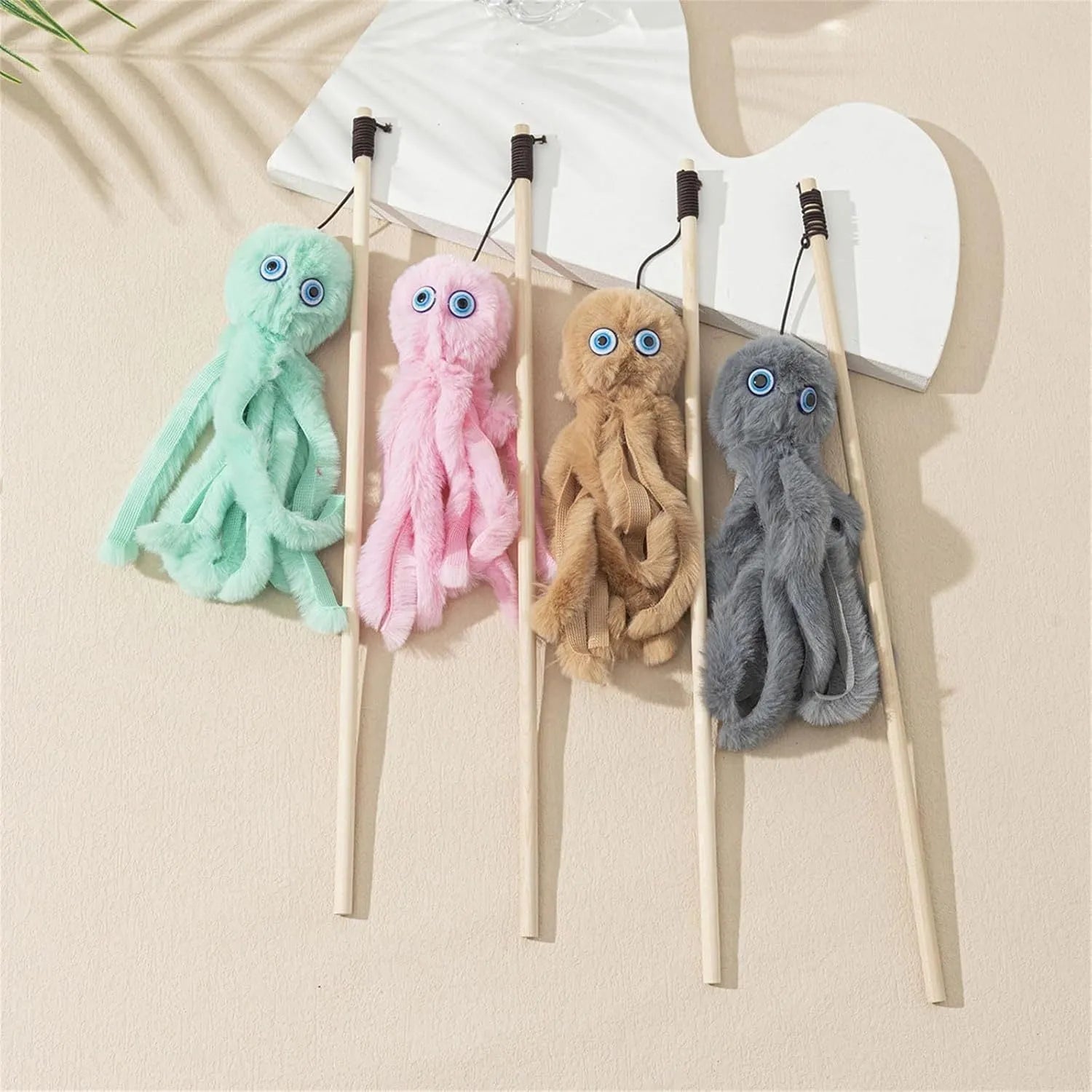 Octopus-themed cat toy with long stick attachment in bright colours for indoor feline play