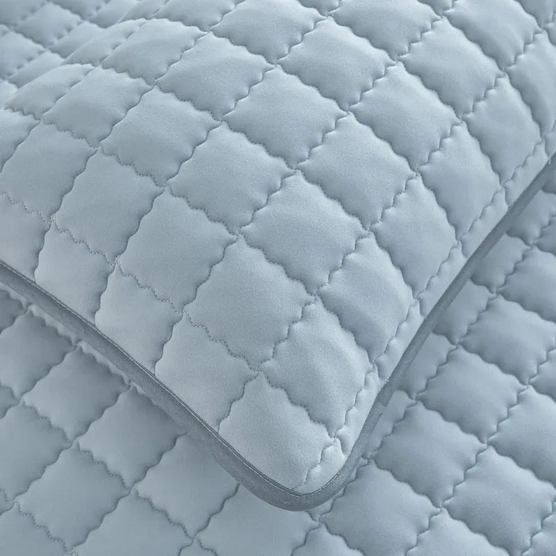 Class A waterproof washed cotton fitted sheet in blue, shown fitted on a mattress corner.