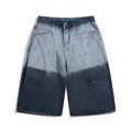 Tie-dye gradient worn looking washed-out cropped jeans in blue, loose fit mid waist style on model