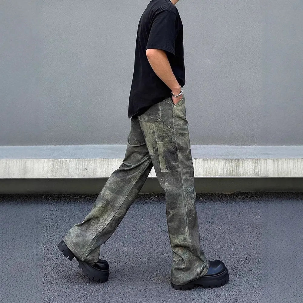 Men's straight leg jeans with a retro digital camouflage print on blue denim fabric.