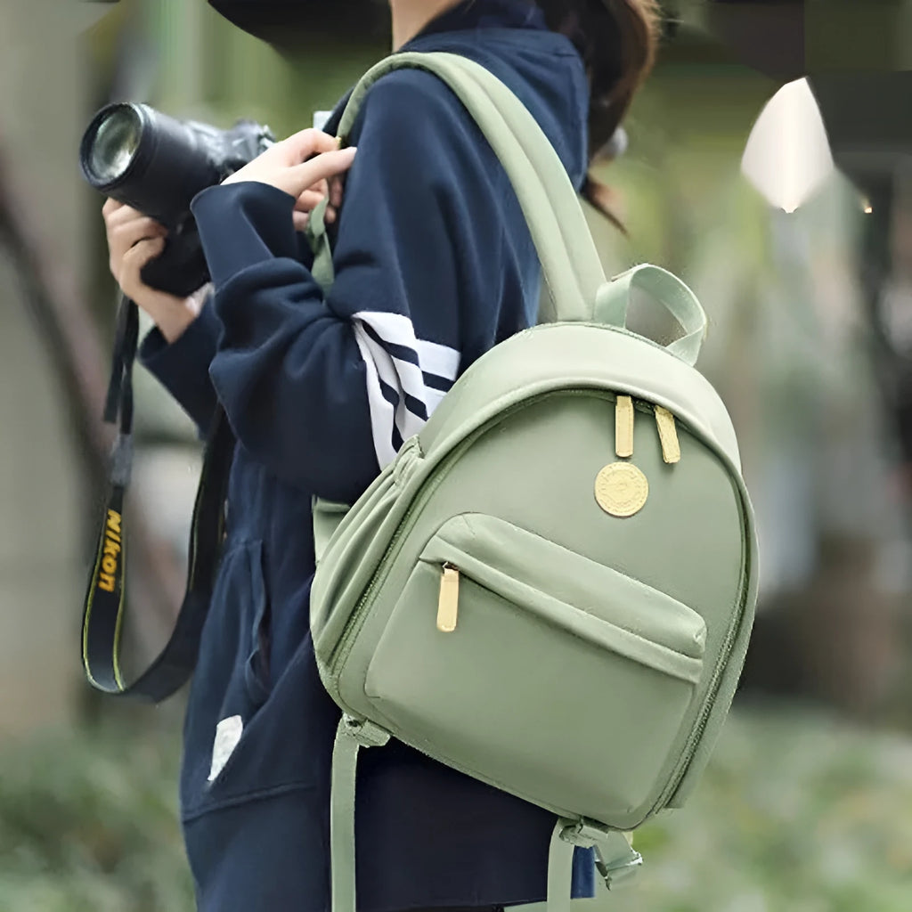 Women's polyester shoulder camera bag in solid colour with shoulder strap and detachable tablet insert