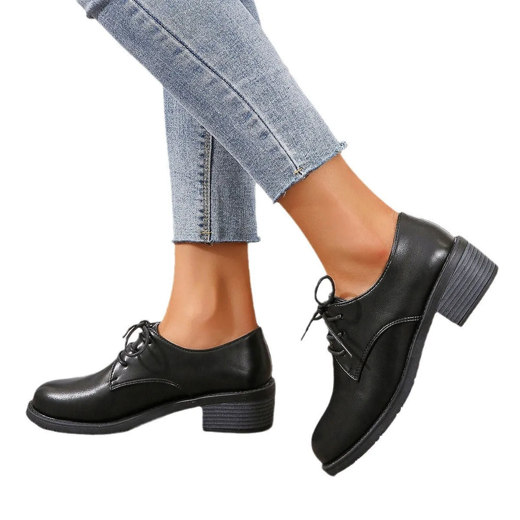 Black women's work shoes with chunky heel and soft sole for professional wear