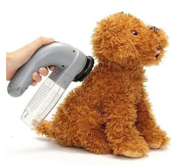 Grey portable pet hair removal vacuum brush with soft rubber head for grooming dogs and cats