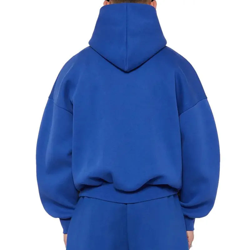 Man wearing a solid-colour fleece-lined cotton hoodie with wool lining.