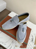 Pair of high-top gommino slip-on loafers in a choice of colours with round toe and rubber sole.