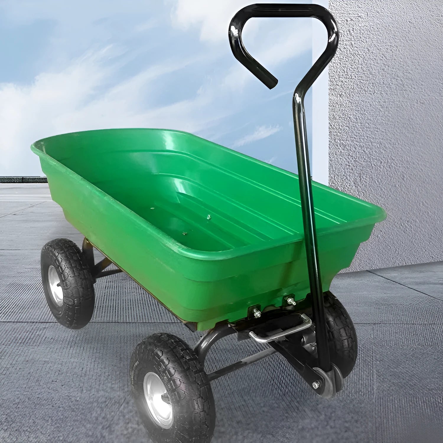 Green four-wheel plastic dump truck with steel frame and tipping bed for agricultural use.