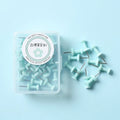 Boxed set of macaron colour plastic push pins in cherry blossom powder, mint green, and lavender, including small and large sizes