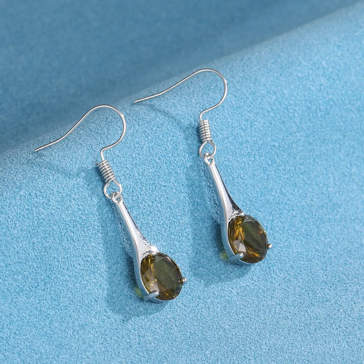 Olive green topaz drop earrings with water drop shape and retro style