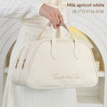 PU leather travel toiletry bag showing dry-wet separation and expansion features