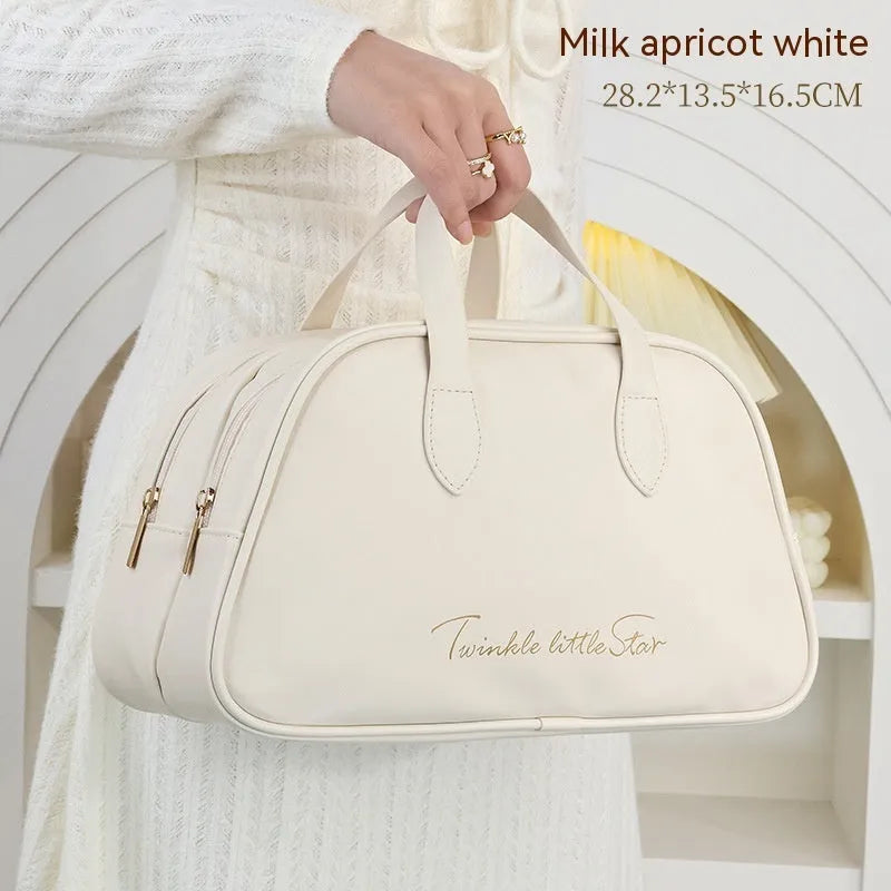PU leather travel toiletry bag showing dry-wet separation and expansion features