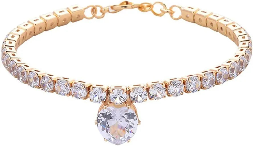 Gold heart-shaped rhinestone dog collar on a white background, showing adjustable chain.
