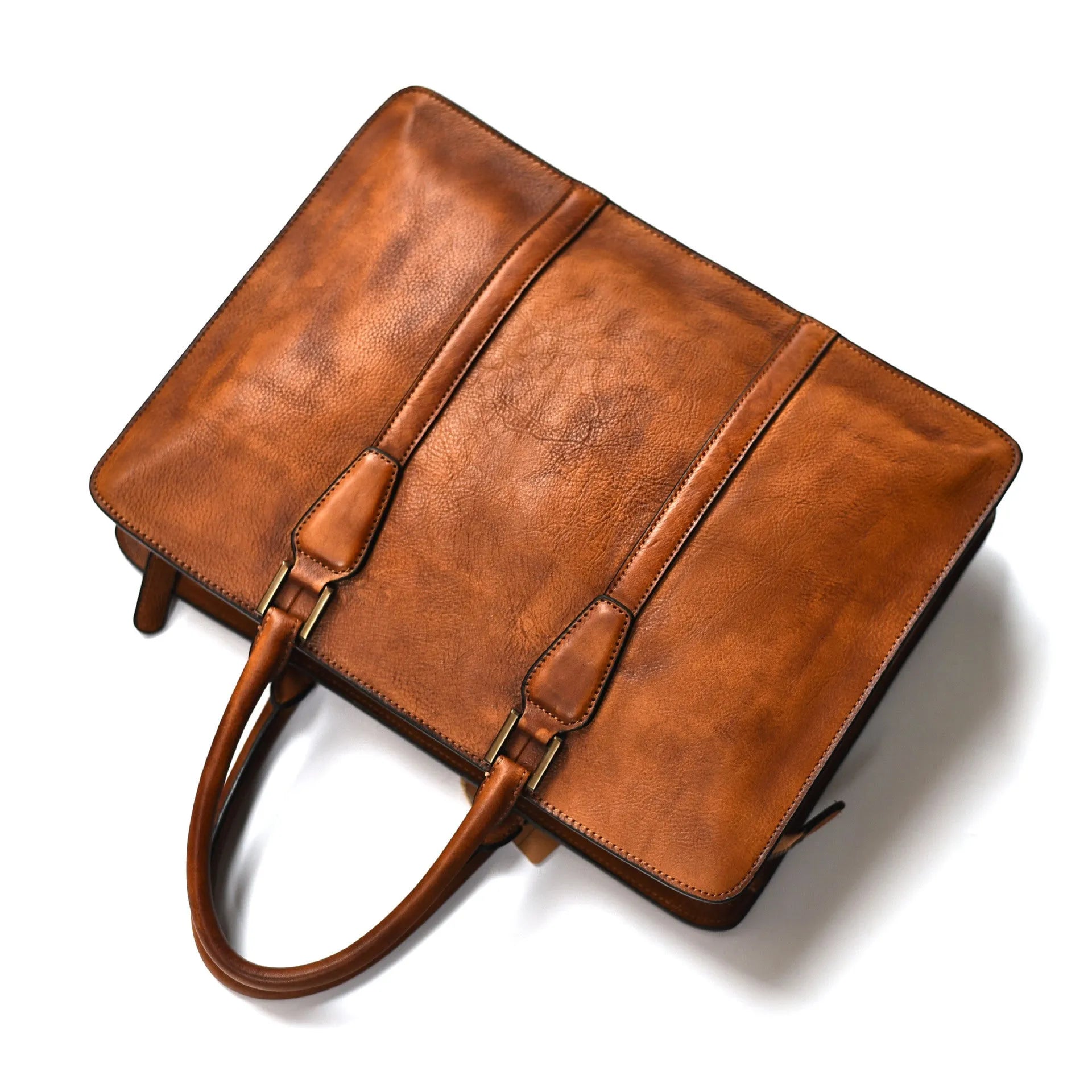 Men's brown leather retro handbag with horizontal square shape and zipper opening.