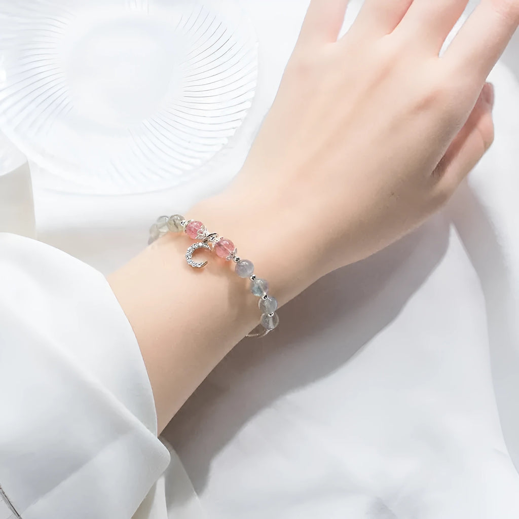 Handmade natural moonstone bracelet with crescent moon charm on adjustable chain