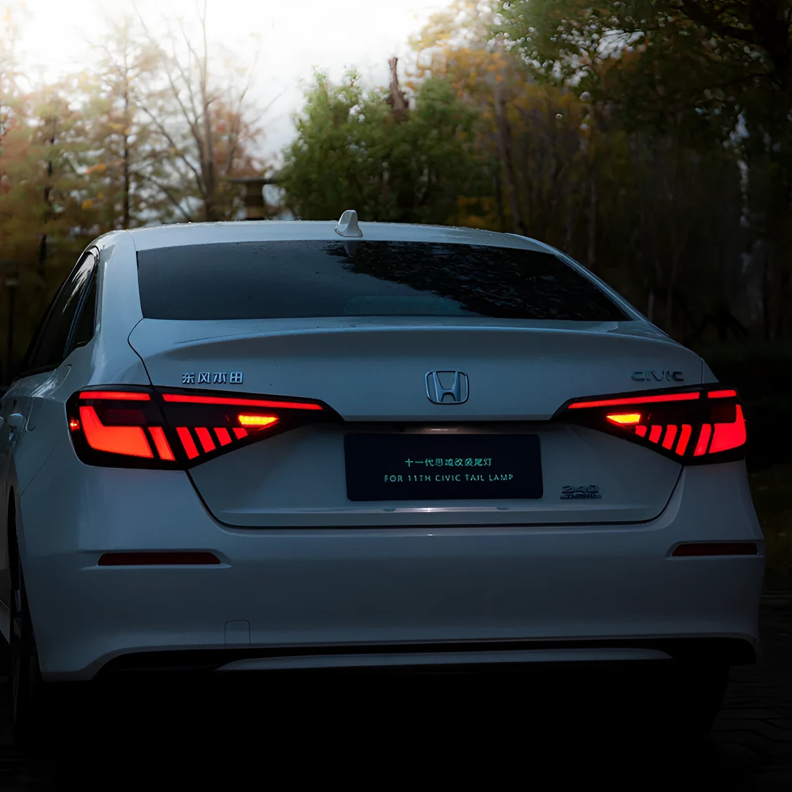 11th generation Honda Civic modified LED taillights in black and red with sequential streamer indicators
