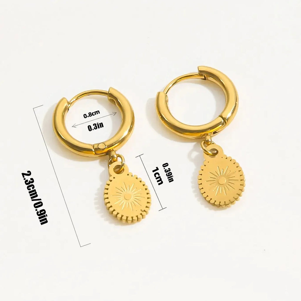 A pair of stainless steel geometric ear button earrings with an ellipse detail, style XY-EH005.