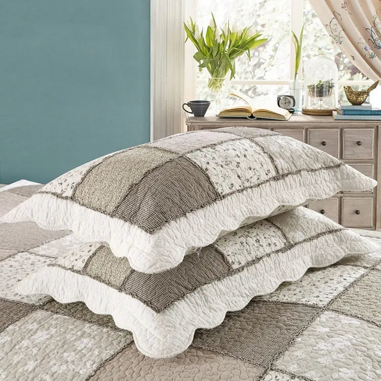 Pure cotton quilted bedspread three-piece set in a patterned colour with two matching pillowcases.
