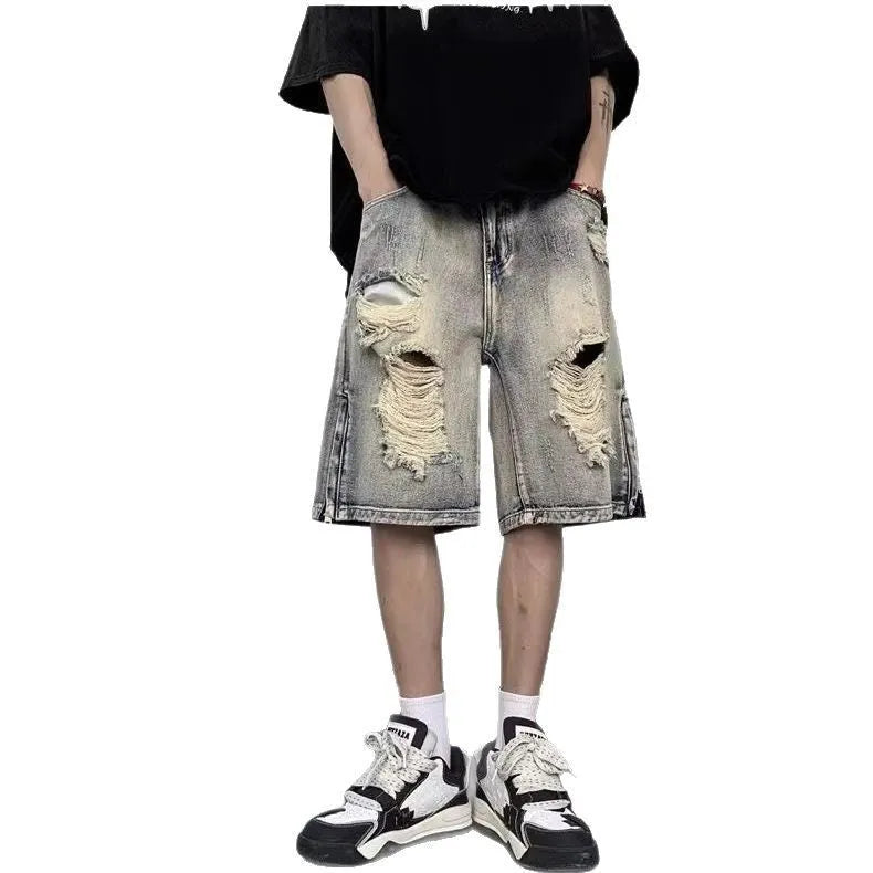 Blue retro tattered denim shorts with wide-leg loose fit for women, side view