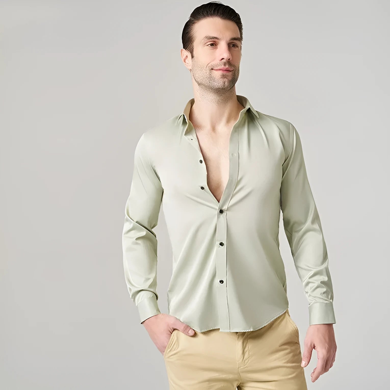 Men's grey stretch long sleeve polyester work shirt on a hanger