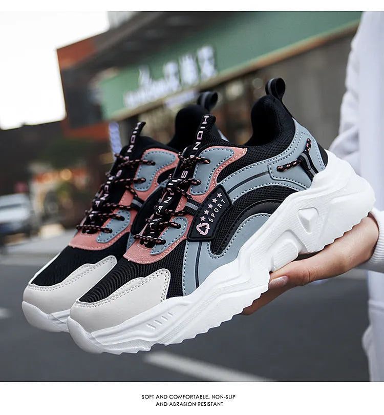 White women's thick-soled casual sports shoes with mesh upper and buckle detail