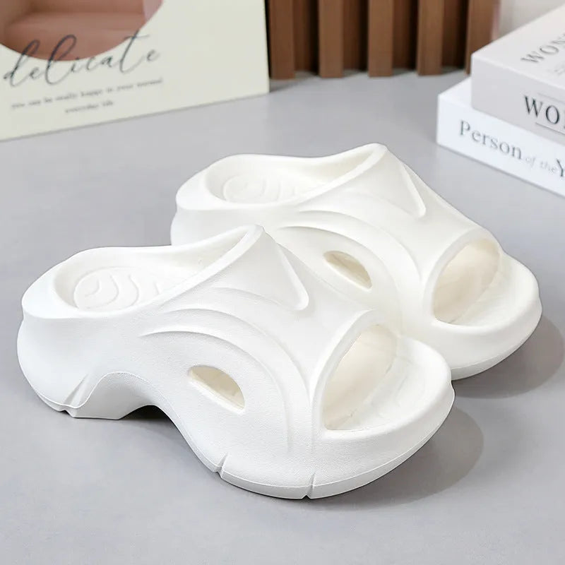 Women's thick-soled EVA slippers in rose red colour with round toe.