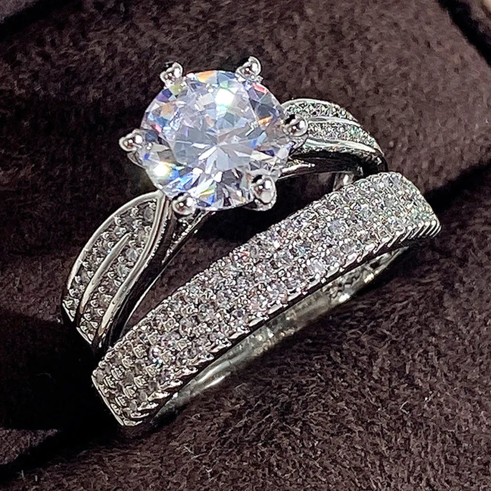 White gold colour alloy wedding bracelet with combined ring design and round geometry elements