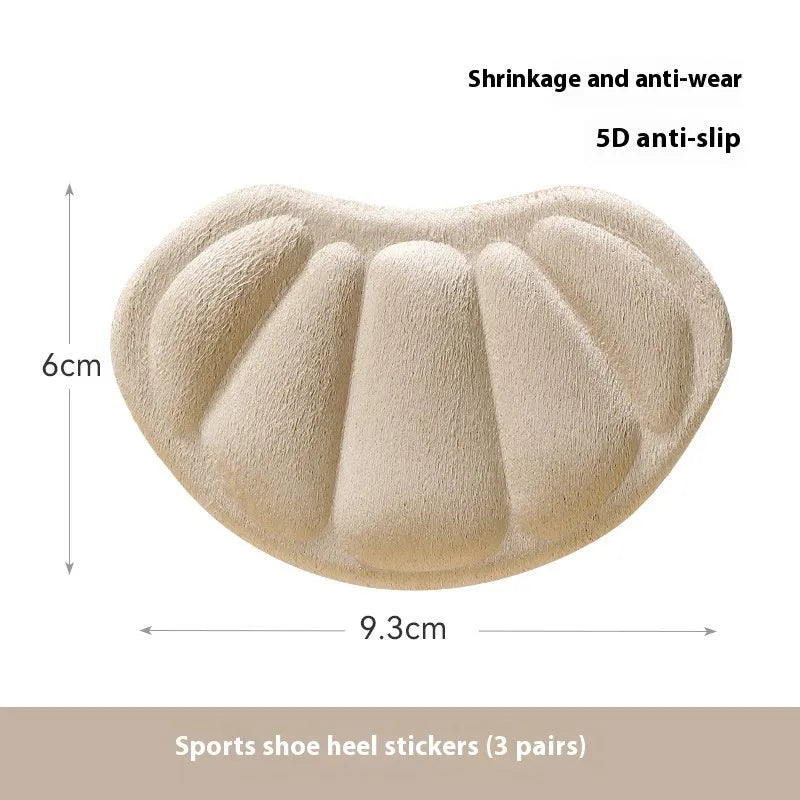 Three pairs of camel-coloured suede anti-slip heel cushion pads for shoes, shown with adhesive backing.