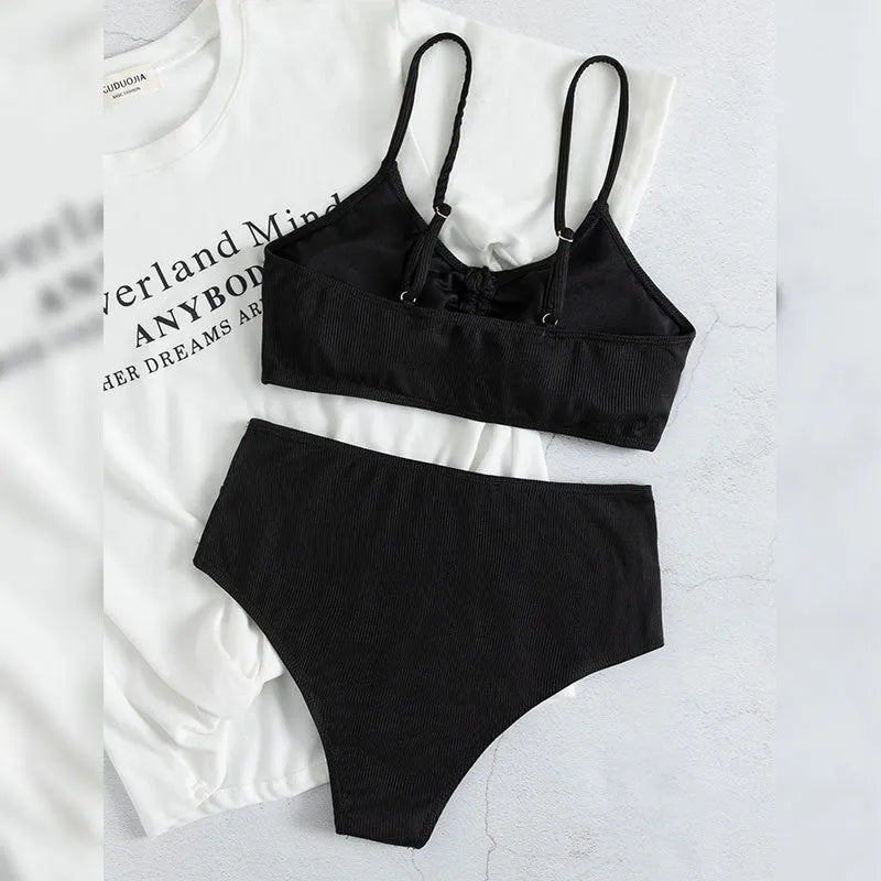Women's black nylon sling split high waist bikini swimsuit set with top and shorts
