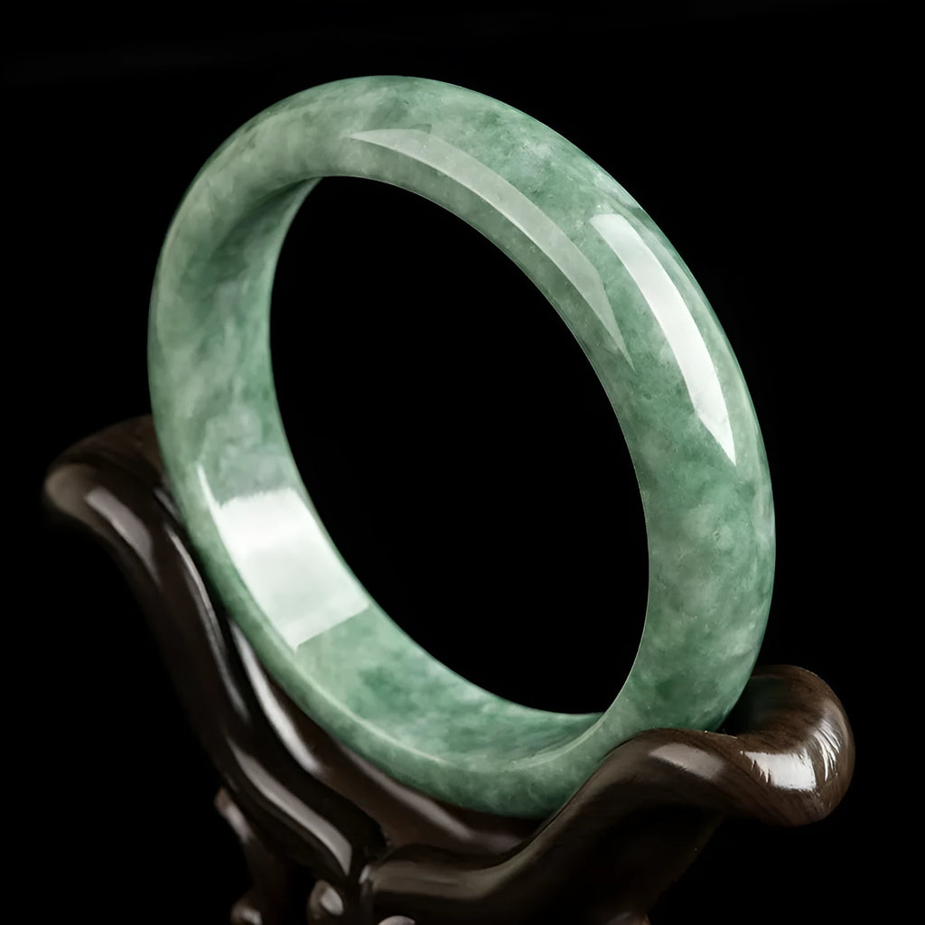 Natural emerald deep pea green jade bracelet simple style on white background with certificate and gift box