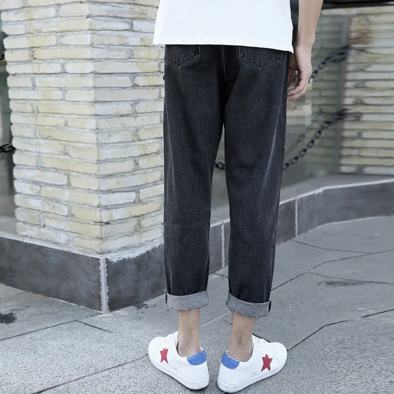 Men's straight-leg loose fit jeans in cotton fabric available in black or blue colours