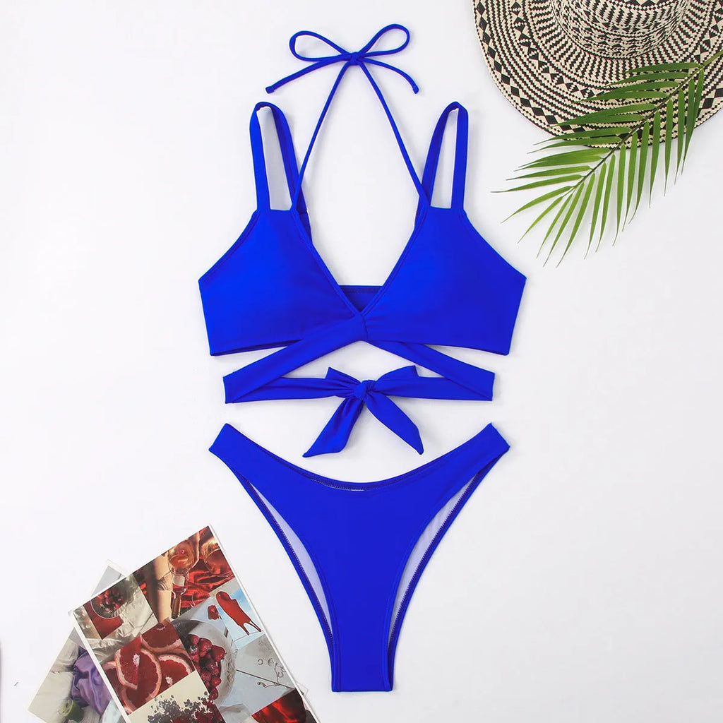 Solid colour women's bikini swimsuit on hanger showing sleeveless design and briefs style