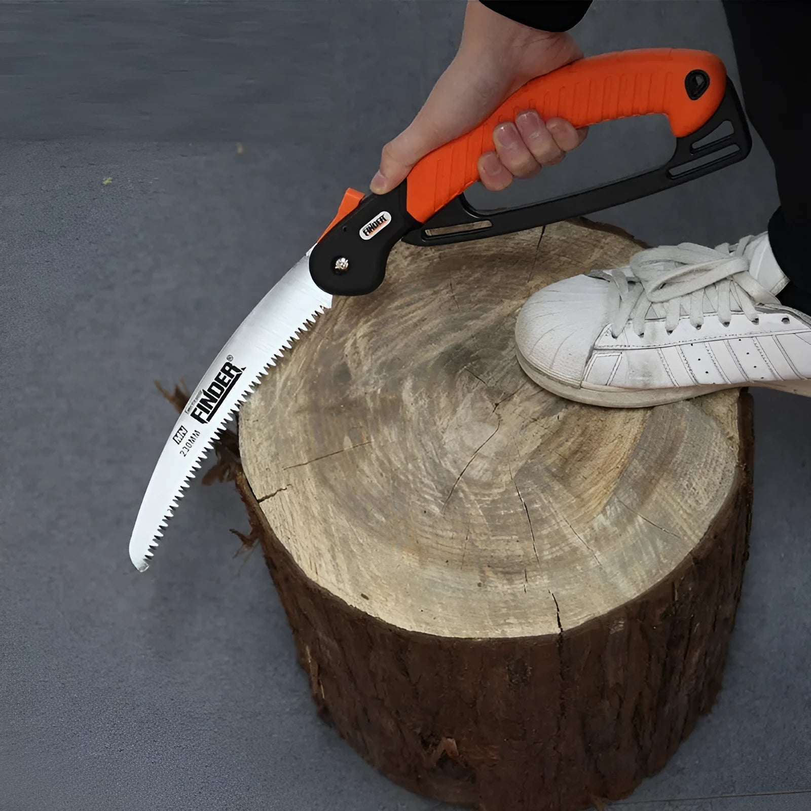 Folding garden saw with 230mm steel blade and textured TPR handle, shown open and closed