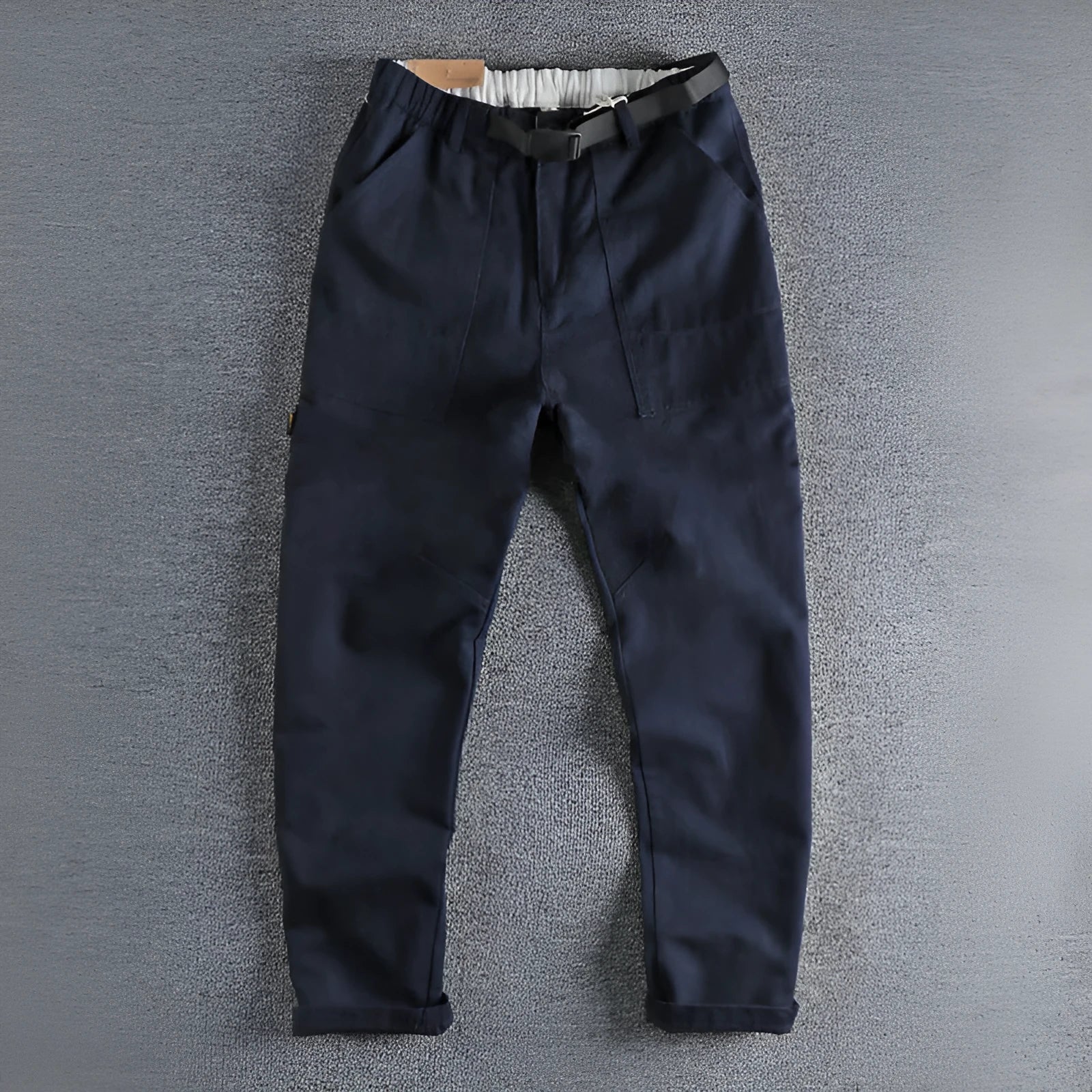 Men's dark blue cotton work trousers with flat front design and straight leg.