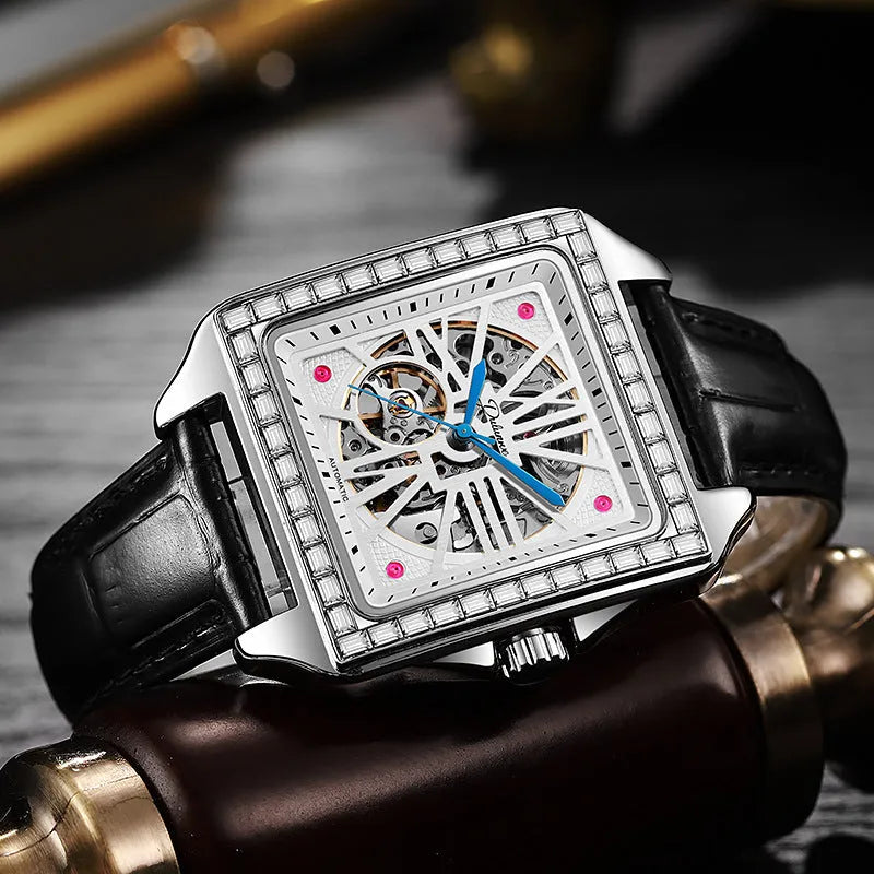 Men's square automatic watch with diamond-studded bezel on a black leather strap