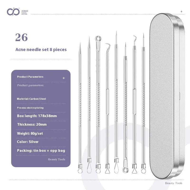 Four silver metal acne needles with fine pointed tips laid out on a surface.