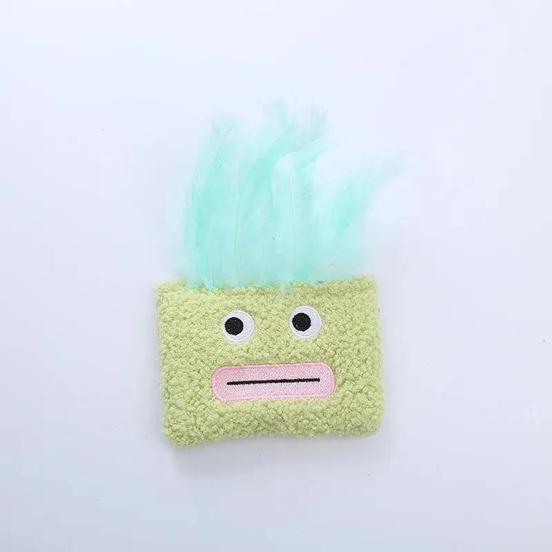 Big mouth explosion head shaped catnip plush toy in blue, green, orange, and purple colours