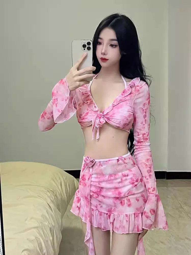 Women's floral bikini swimsuit set in cherry blossom powder colour showing front and back styling