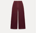 Women's black polyester fleece two-piece suit with long sleeve top and wide-leg trousers
