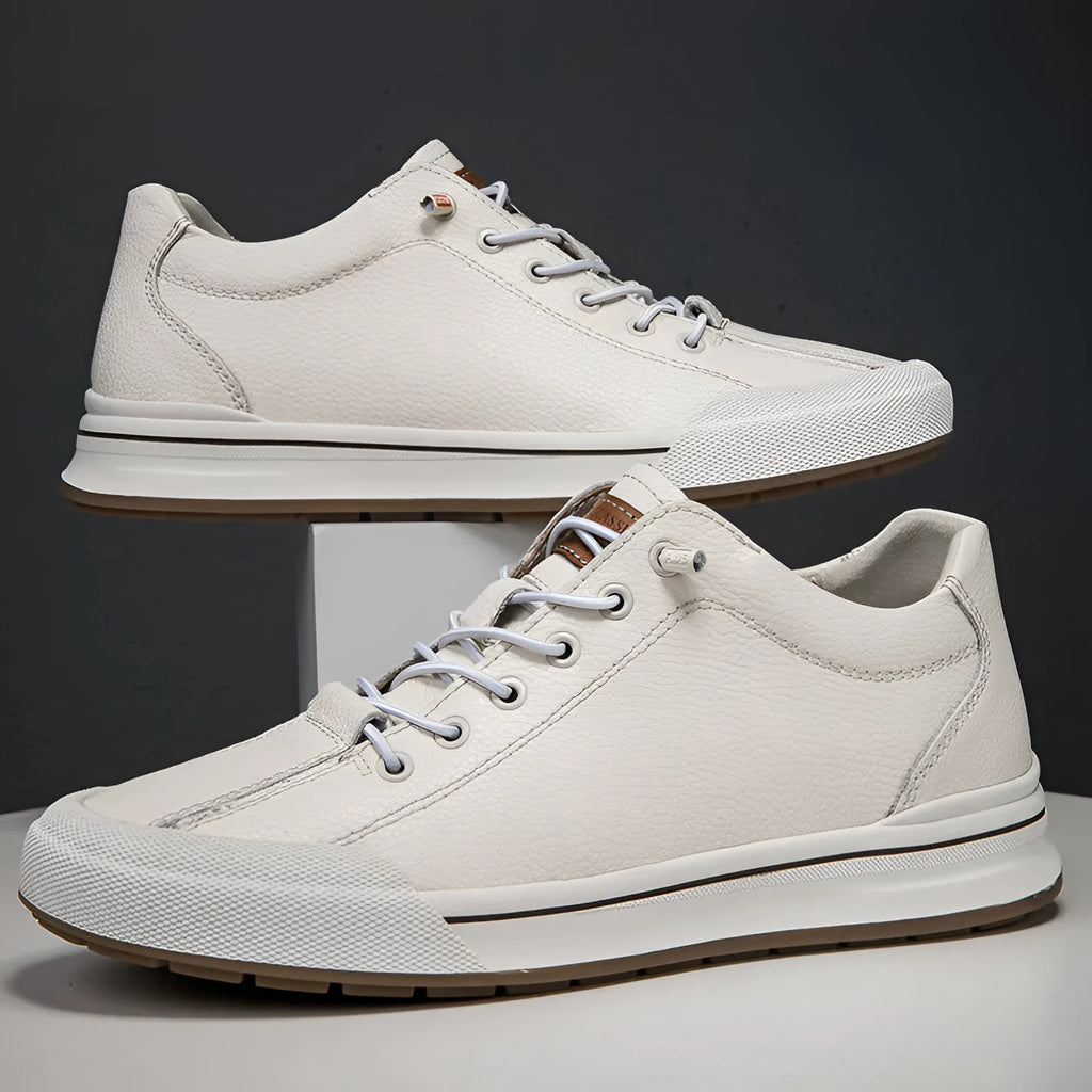 Men's white matte leather casual shoes with flat heel and round toe on a plain background