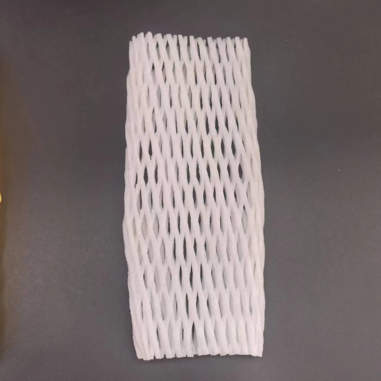 White foam protective case showing stretchable net construction for item cushioning