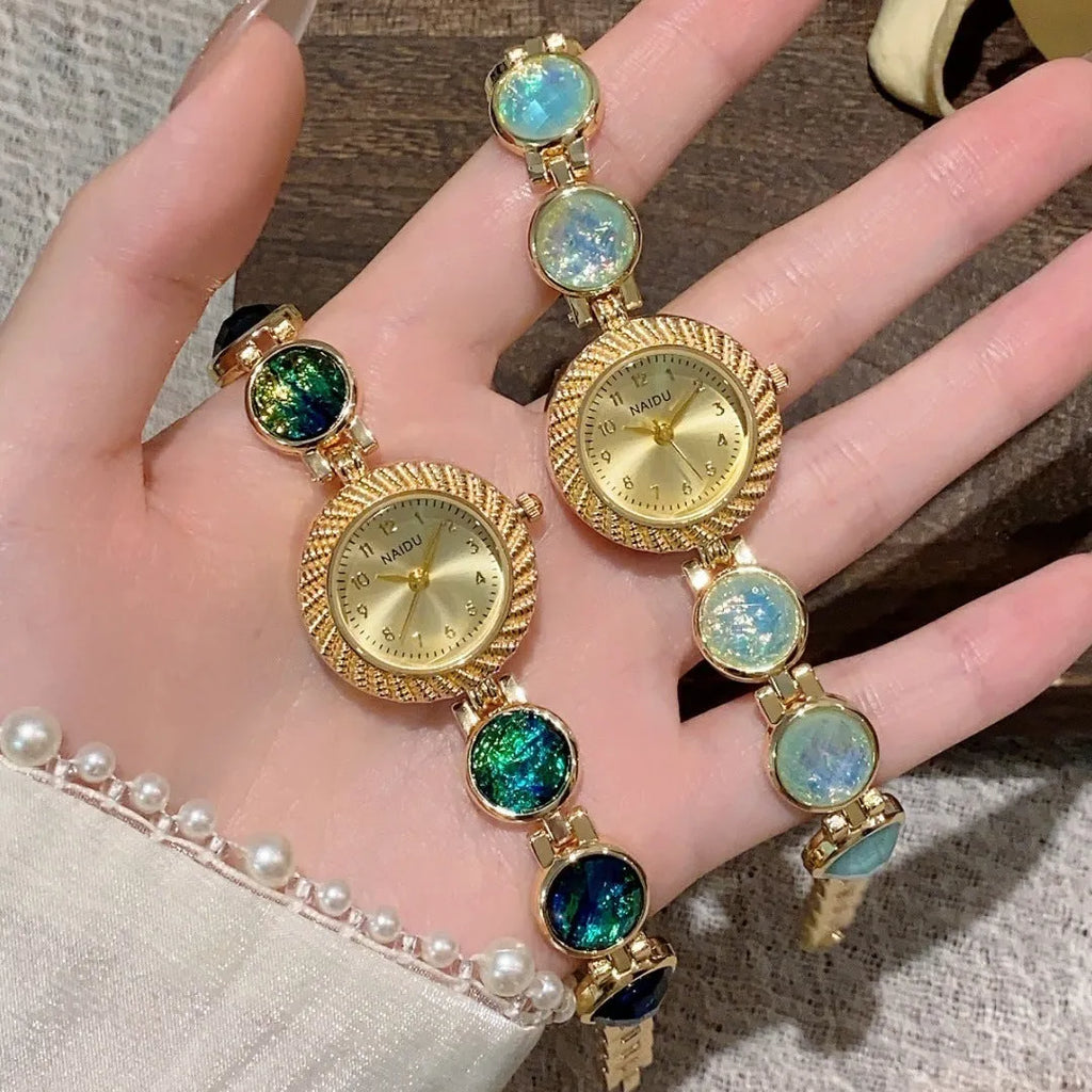 Women's 25mm round quartz watch in zinc alloy case, shown in various colours.