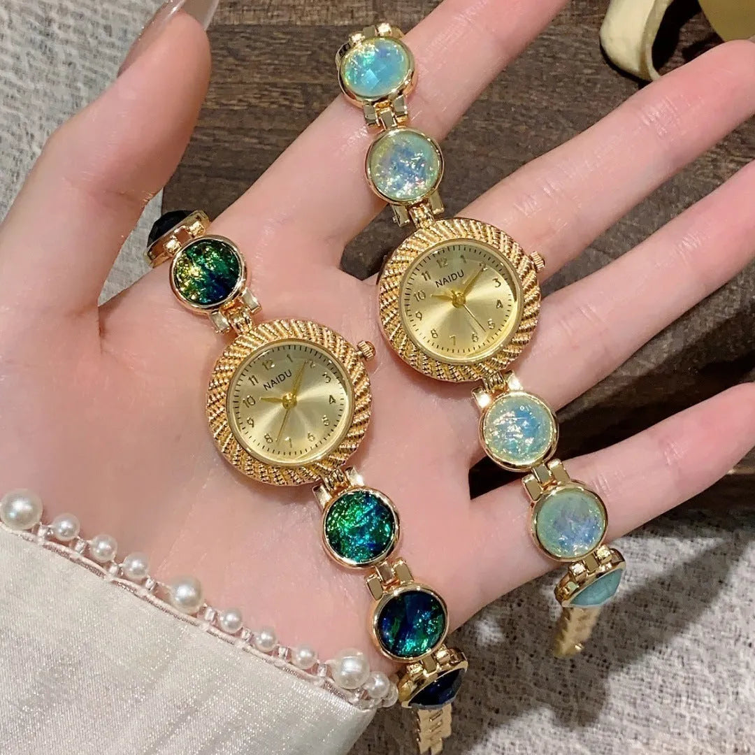 Women's 25mm round quartz watch in zinc alloy case, shown in various colours.
