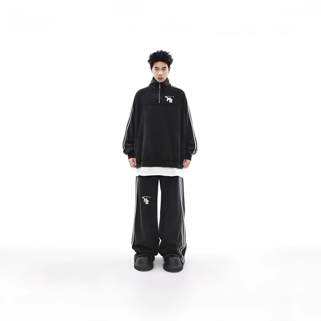 Black Hong Kong style polyester hoodie with stand collar on a hanger.