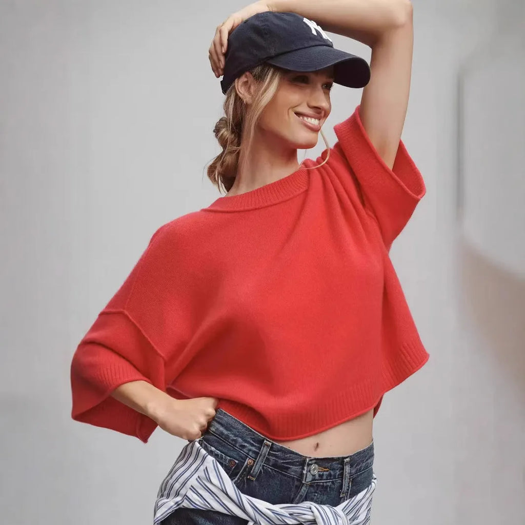 Red short t-shirt on a model showing exposed navel detail, style example for white colour option also available.