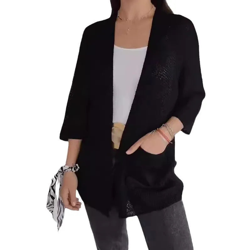 Women's waffle-textured cardigan coat in army green with nine-quarter sleeves and pockets.