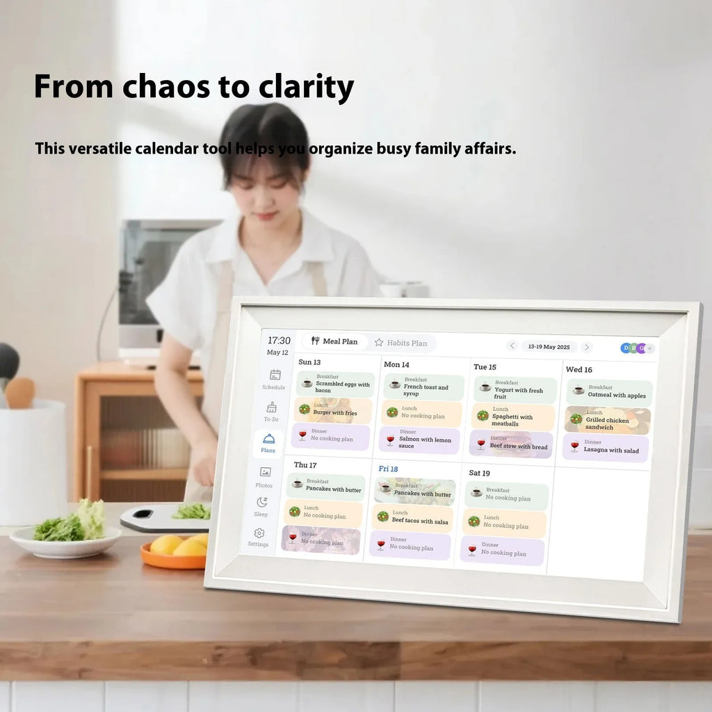 White 15.6 inch smart digital photo frame showing family photos on Full HD screen