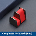Zinc alloy car dashboard glasses holder in four colours measuring 3.7x3.2x2.5 cm