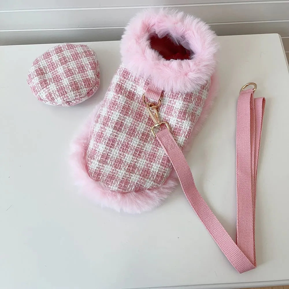Cat wearing pink hooded cloak with matching beret and attached rope leash costume set