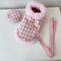 Cat wearing pink hooded cloak with matching beret and attached rope leash costume set