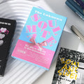 Box containing two printed postcards with fresh artwork designs for greetings and simple gifts.
