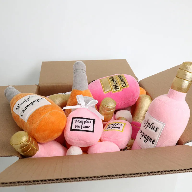 Soft green plush wine bottle dog toy with squeaker for play enrichment.